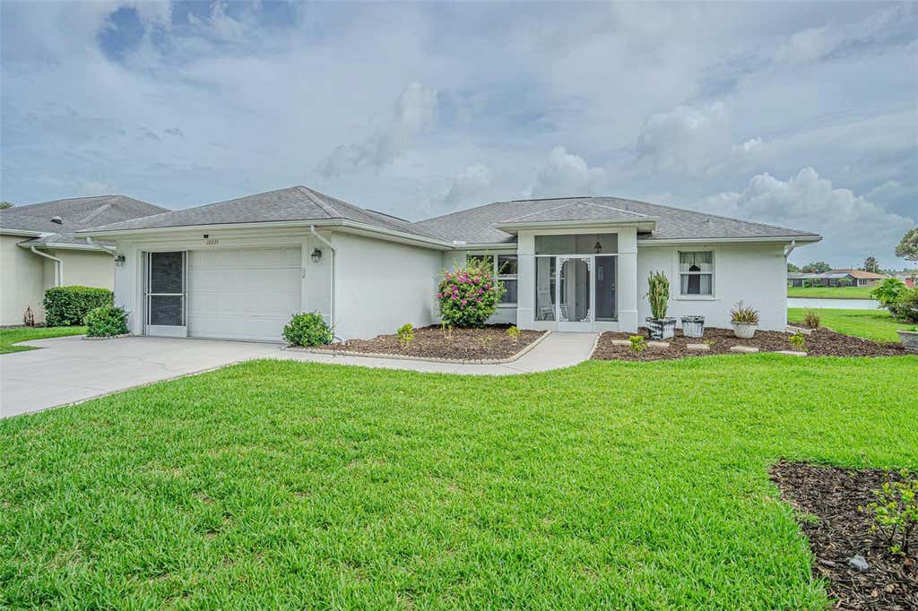 Photo of 10535 Moshie Lane, San Antonio, FL 33576 (MLS # TB8479860)