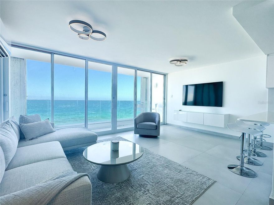 Experience coastal living at its finest in this fully remodeled, furnished 1-bedroom, 1-bathroom apartment with 1 parking space (across the street at Ashford 890). Enjoy unobstructed ocean views from every room and top-of-the-line fixtures and furniture for ultimate comfort and style.
The apartment is equipped with a full automatic backup battery system, while the building offers 24-hour security, a water cistern, a backup generator for common areas, a pool, and direct beach access through the adjacent park.