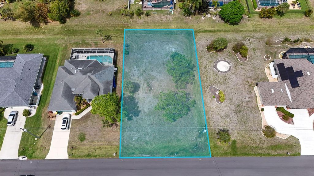 Photo of 9 Long Meadow Lane, Rotonda West, FL 33947 (MLS # D6146713)