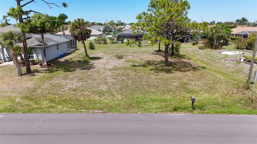 Photo of 9 Long Meadow Lane, Rotonda West, FL 33947 (MLS # D6146713)