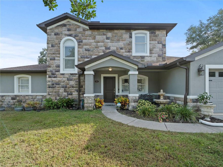 Welcome to your dream home! This stunning property boasts 4 bedrooms, 3 bathrooms, and 1993 square feet of living space, all situated on a spacious 1.1-acre lot. As you approach the house, you'll be greeted by a charming rock fascia on the front, adding to the home's curb appeal. Step inside and you'll be impressed by the wood plank tile flooring on the main floor and laminate wood flooring upstairs, giving the home a modern and sleek look. The kitchen and master bathroom have been beautifully updated, providing a luxurious and inviting space to cook and relax. The Double pane windows ensure energy efficiency and noise reduction. Step outside and you'll find a pool with a covered lanai and a paver deck, perfect for summer days spent lounging and entertaining. Need extra storage? The 24x36 detached garage with two 10' doors, 50 AMP service, and water connection provides ample space for all your toys and projects. Additional features of this amazing property include a 12x24 shed with electricity, perfect for a workshop or extra storage, as well as a fully fenced backyard with a dog run and even a chicken coop. Don't miss out on this incredible opportunity to own your own slice of paradise. Schedule a showing today and make this house your forever home!