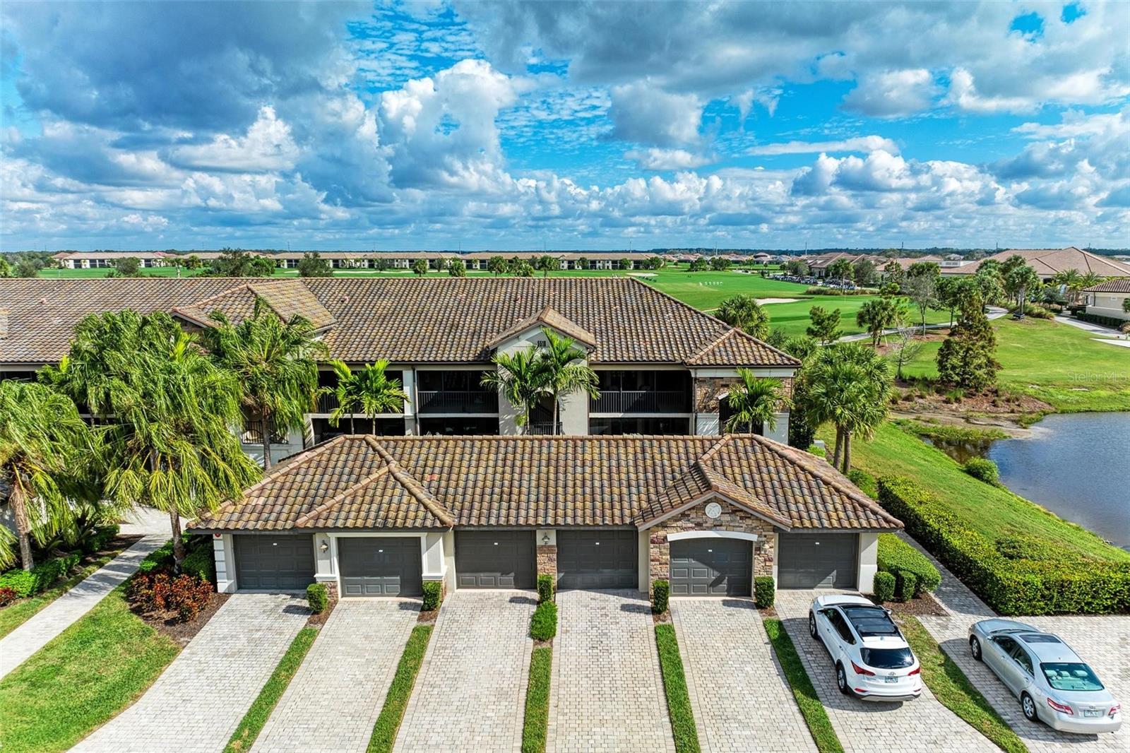 Available September 1st, 2025- December 2025 Experience luxury resort-style living in this beautifully furnished 2-bedroom, 2-bathroom Veranda condo in Lakewood National Golf and Country Club. offered turnkey, this home features an open floor plan, designer furnishings, and two private screened in lanais perfect for enjoying stunning golf course views. The detached one car garage provides added convenience and storage. Located in a gated, golf and resort community, residents enjoy a championship 36 hole Arnold Palmer golf course, a resort style lagoon pool, a full service spa, fitness center, tennis and pickle ball courts, and an on site restaurant with tiki bar. Just 15 minutes from UTC's shopping and dining and 30 minutes from Florida's Gulf Coast beaches, this condo offers the perfect blend of luxury, convenience, and breathtaking surroundings.