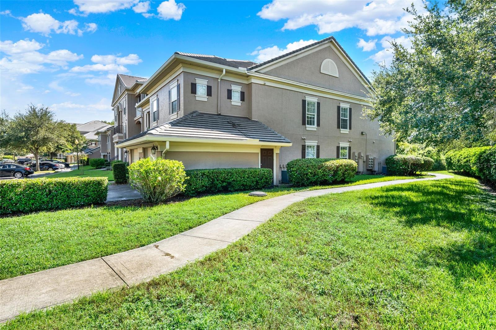 Welcome to a beautifully upgraded ground-floor unit tucked away in the serene back of the community, offering peaceful conservation views from your private screened patio. This spacious 3-bedroom, 2 full bath home features tile, wood flooring throughout for easy maintenance and modern appeal. Freshly painted with upgraded cabinetry in every room, granite countertops and stainless-steel appliance in the kitchen. In-unit laundry room with washer and dryer included. Split floor plan for privacy and functionality and owner storage closet located on enclosed patio. Enjoy the tranquility of nature from your screen enclosed patio, perfect for morning coffee or evening unwinding. Located in the desirable Capri at Hunter’s Creek community, residents enjoy gated entry, resort-style pool, fitness center, sand volleyball court, water, sewer and trash included in dues along with being in close proximity to parks, shopping centers, restaurants, Orlando International Airport, major theme parks and highways. The Hunter’s Creek community offers parks, playgrounds, basketball courts, pickleball courts, community events, walking trails, recreation centers, and the list goes on and on. Call today for your private showing as this condo offers the perfect blend of comfort, style, and location.