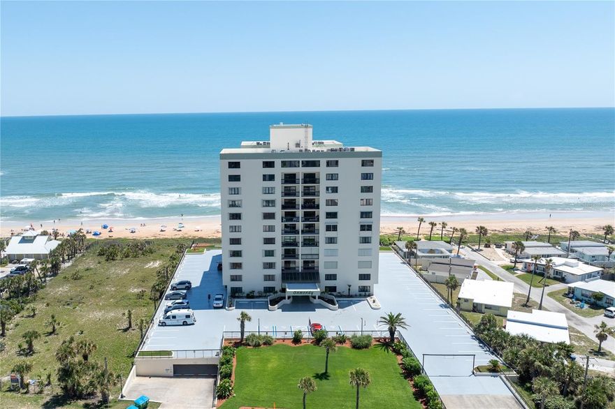 Rare opportunity to own a fully furnished, south-facing condo on Ormond's desirable no-drive beach with short-term rental/Airbnb approval. Ideal as a second home or income-producing investment property. Enjoy ocean breezes from the expansive 25-ft balcony featuring new impact sliders/windows and accordion hurricane shutters for peace of mind. Interior updates include luxury vinyl and tile flooring throughout, fresh paint, smart thermostat, in-unit fire sprinklers, new stainless steel refrigerator, USB kitchen outlets, AC (2020), and water heater (2022). Spacious primary suite offers dual vanities and a walk-in closet. In-unit laundry with washer/dryer included. Milestone reports available. Building amenities include a heated pool, fitness room, shuffleboard, and a huge 11th-floor club room. Roof and elevators updated approximately 5-6 years ago. Owner managed rentals and made 13k Jan-March. All information recorded in the MLS is intended to be accurate, but cannot be guaranteed.