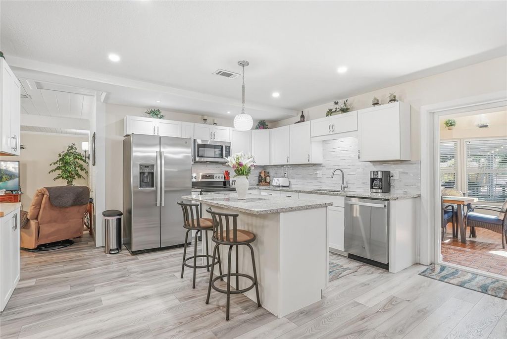 Photo of 12109 Forest Hills Drive, Tampa, FL 33612 (MLS # TB8507811)