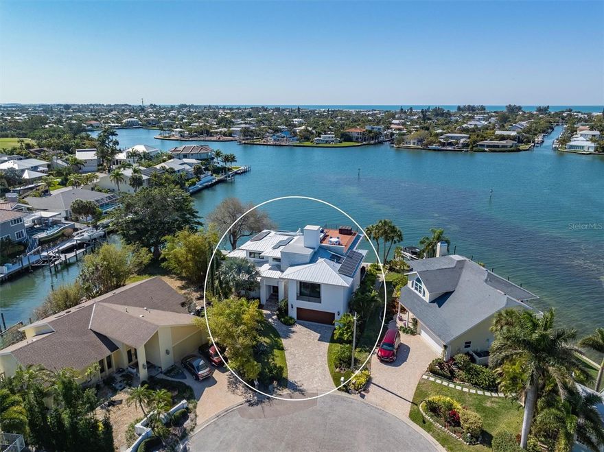 Welcome to the 726 Key Royale Drive show stopper! BUILT BRAND NEW IN 2018.Nestled at the northern-most point of Key Royale in the exclusive North Point neighborhood on Anna Maria Island. This unique Bimini Bayfront home with breathtaking expansive vistas AND DEEP WATER FOR BOATING is a coastal masterwork built to fortress-like standards, offering unparalleled durability, safety and peace of mind in today’s environment. Engineered with all poured concrete, including the re-bar reinforced foundation, the property is also equipped with all Miami-Dade rated hurricane impact glass, and a whole house Generac generator (500 gallon LP GAS).  This 5,541 total sq.ft. of luxury coastal contemporary boasts 5 bedrooms ENSUITE 5.5 bathrooms, a den, office and workout flex space AND is offered FURNISHED less personal artwork and a few exclusions. Roof top terrace and oversized 2 car garage plus golf cart parking.  There are TWO primary suites, one on the main level and the other is on the 2nd level.  The home is equipped with state of the art solar electric system on the roof which keeps the electric bills to a minimum. Significant features include: Elevator access to all floors, electric blinds throughout the home, on demand tankless water heater, custom window treatments, custom oversized closets in each bedroom, zoned 2 AC systems, premium grade  GE Monogram kitchen appliances (Gas cooking), ice machine, wine refrigerator, and bonus 2nd refrigerator.  Sliding walls of glass opens to spacious terraces  and guests will delight in the views across the bayou with breathtaking sunsets and skies. There is an abundance of sea and bird life at all times of the day including dawn and dusk. For water sports and boat lovers there is a new 5” x 38” dock in 2020, New 138 ft SEAWALL in 2020 and a cleverly designed kayak launch to effortlessly lower kayaks and paddle boards into the water.
Enjoy the many wonderful amenities that the North Point/Key Royale neighborhood has to offer including the Key Royale Golf club, 9 hole golf course, tennis/pickle ball courts, and a clubhouse.  There is plenty room for a pool (sketch attached is for a 6" x 22" size) and design and price are in attachments, A true one-of-a-kind property that seamlessly blends elegant design with practical livability all while living the coastal dream of Anna Maria paradise! Assumable Flood policy of just $1,180 per year!