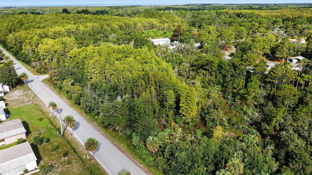 Photo of 17010 Ridgeline Trail, Hudson, FL 34667 (MLS # W7879409)