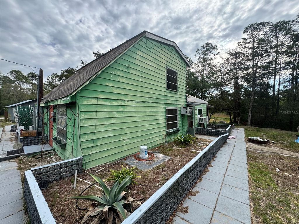 Photo of 17528 Coyote Road, Hudson, FL 34667 (MLS # TB8499664)