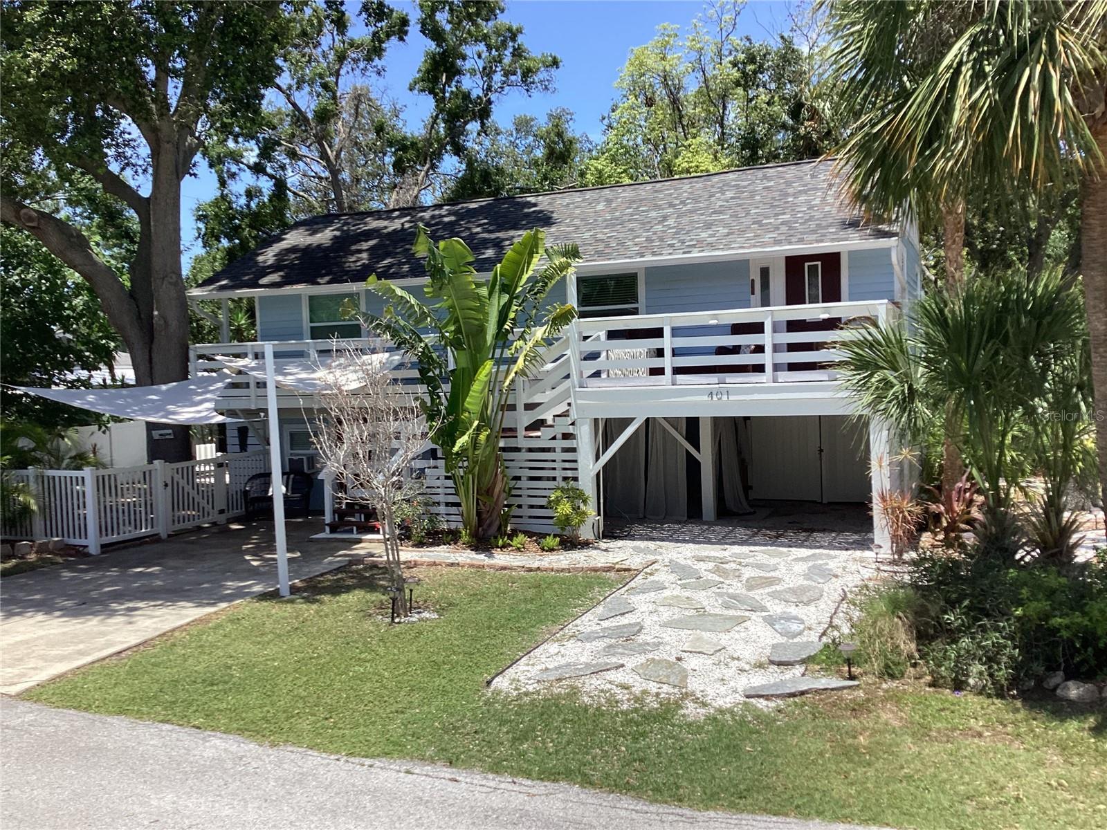 “Sandy Toes” a successful vacation spot, short term and long term rental is ready for your investment, or your own private residence. Traditional stilt home in the charming Old Florida community of Crystal Beach, a golf cart friendly area. Two seperate outdoor entrances- 1st floor enters to an updated cozy suite with full bath, newer windows and heat/AC unit. Laundry, utilities and storage on 1st level, as well as romantic outdoor dining, grilling area and a four person spa! The fully fenced yard features native landscaping, fire pit and lighting, perfect for winter gatherings. Second level welcomes you to bright open living - dining- kitchen concept with beautiful chevron ceramic tile. Extra large bedroom suite with pocket door to a roomy three piece bath. Newer windows, new AC unit, fresh paint, and a recent 4 point is available, furniture is negotiable. Steps to the Pinellas Trail, three blocks to Gulf Shore Park, in between top beaches and amenities like Honeymoon Island State Park (and dog beach) and Fred Howard Park. Attractions and restaurants; Tarpon Sponge Docks and delightful downtown Dunedin breweries, baseball, with spectacular sunsets, a beachy small town vibe. 40 minutes to airports and downtown Tampa, St Petersburg. Your future residence, or rental awaits. Buyer to confirm all current unincorporated Pinellas County rental policies. Agent is owner.
