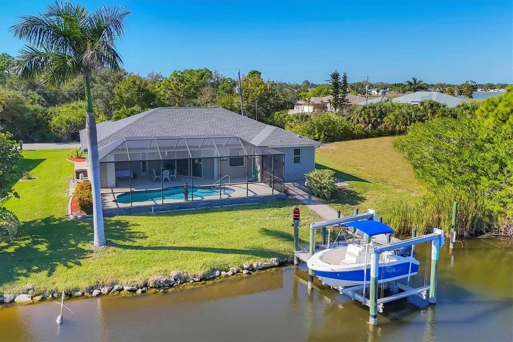 Photo of 8058 Santa Cruz Drive, Port Charlotte, FL 33981 (MLS # D6144911)