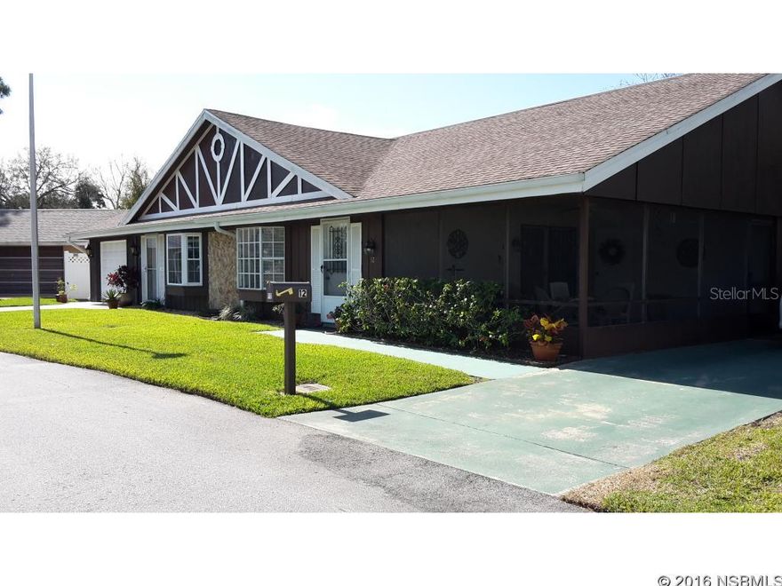 Enjoy waterfront views from your living room or from spacious screened porch. Vaulted ceilings in living and dining areas, beautiful bay window overlooking pond and fountain. New complete AC system in 2013. Both bathrooms updated recently with new cabinets,  and new toilets. New floors in kitchen and hall bath last month. Kitchen redone in 2005 with new counter tops, cabinets . New stove in 2010. New dishwasher in 2013. Inside laundry with  washer, and dryer. New architectural shingle roof in 2005. Security gates in master bedroom provide you with peace of mind. Wonderful location with peaceful water view and lots of outside living space. Long drive way accommodates two vehicles easily. Nestled between 2 golf courses with optional membership to two community pools. Centrally located close to dining, shopping and 4 miles to the beach. Low annual homeowners association dues provide standard cable TV, water to the sprinkler system, subterranean treat and repair termite bond and common area. Some items of furniture can be purchased separately. Humidistat protects your interior when you are away for long time periods ;Water: City