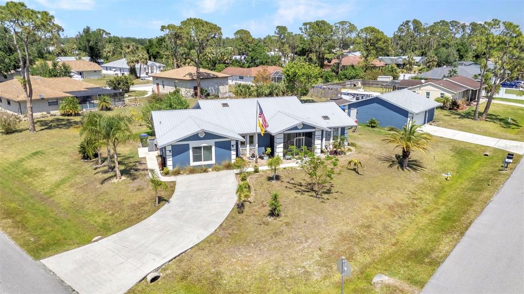 Photo of 4474 Ozark Avenue, North Port, FL 34287 (MLS # C7508632)