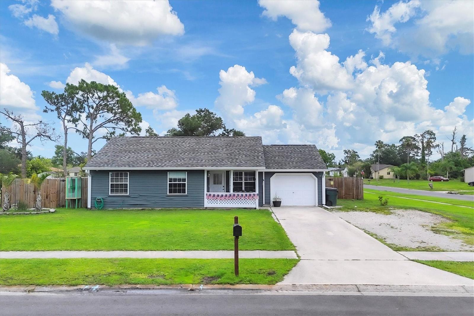 Discover easy living in this charming 2-bedroom, 1-bath gem nestled on a desirable corner lot in Highland?Ridge, one of North?Port’s most convenient neighborhoods. A brand-new 2024 roof, newer A/C with UV lights, full storm-ready hurricane shutters, and low-maintenance vinyl flooring throughout mean you can simply move in and relax. The beautifully updated kitchen—complete with modern cabinetry, sleek counters, and newer appliances—anchors the open living space, while the converted garage offers a flexible bonus room perfect for a home office, studio, or guest retreat. Step outside to a fully fenced backyard that’s ideal for pets, play, or weekend barbecues.Enjoy fresh fruit from the abundance of fruit trees such as moringa, dwarf mulberry, blackberry, lime, Barbados cherry, pomegranate, fig, loquat, elderberry, dragon fruit and jujube. Best of all, you’re moments from neighborhood parks, everyday shopping, and a variety of dining options, keeping everything you need right at your fingertips. Welcome home to Highland?Ridge—where comfort, convenience, and peace of mind meet.