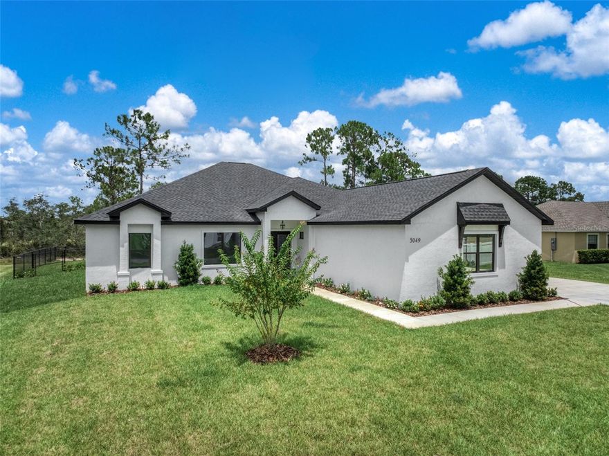 Under Construction. Beautiful custom home in the Manor Hill neighborhood in Sun N Lake of Sebring. Pictures shown of similar home and interior finishes of this home will vary. Double door entry, 10' ceilings, 4 bedrooms and 2.5 bathrooms. Luxury plank flooring throughout the home with tile in bathrooms and laundry. Stunning kitchen featuring granite counters, island with bar seating and premium cabinets. Spacious living area with lots of natural light, dining room with views of back yard and covered patio. Split bedroom floor plan. Luxurious primary suite and amazing en suite bathroom. Dual sinks on split vanity, private water closet and tiled walk in shower. 12,500 sq ft lot with room for pool and outdoor entertaining. Irrigation and landscaping included. This is an HOA with dues of $15/year. Small community surrounded by one of Sun N Lake's premier golf courses. This wonderful neighborhood offers a variety of amenities and activities for it's residents. Located in North Sebring with easy access to medical, emergency and shopping.