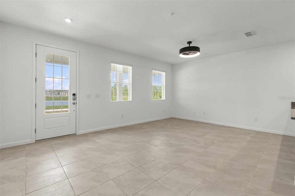 Photo of 10031 Gazebo Alley, Orlando, FL 32832 (MLS # O6446442)