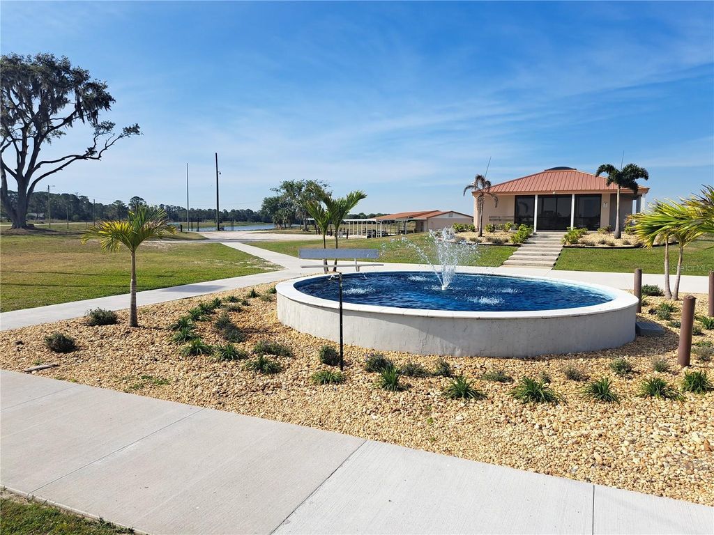 Photo of 2 Laguna Drive, Indian Lake Estates, FL 33855 (MLS # O6391650)