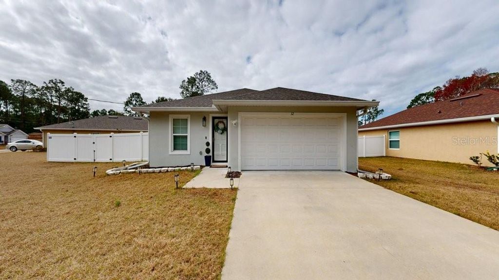 Photo of 32 Rambling Lane, Palm Coast, FL 32164 (MLS # O6400984)
