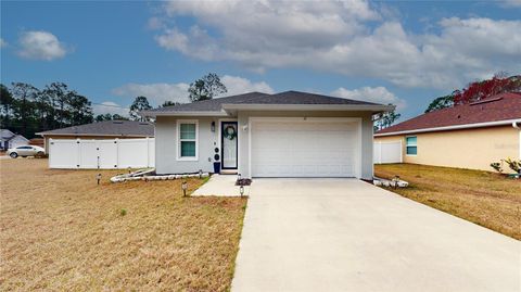 Photo of 32 Rambling Lane, Palm Coast, FL 32164 (MLS # O6400984)