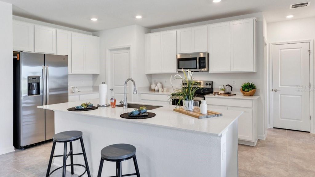 Photo of 5669 Portico Place, Kissimmee, FL 34758 (MLS # O6330385)