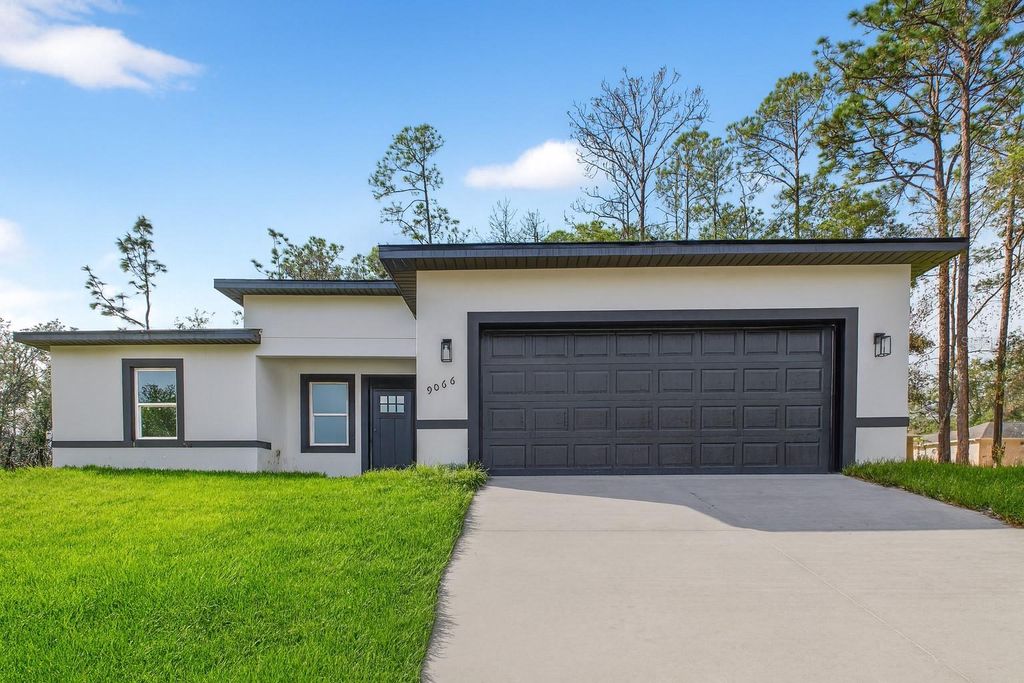 Photo of 9066 N Akola Way, Citrus Springs, FL 34434 (MLS # O6399822)