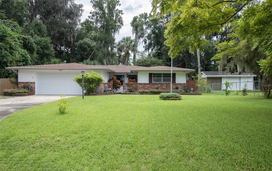 MOVE-IN READY.  ONLY 10 minutes away from the World's Most Famous Daytona Beach.  This property is backed up to a preserve with plenty of privacy. Nestled back at the end of a cul-de-sac is where you will find this Gem. Open floor plan with many options of entertaining. The kitchen boasts a gas stove, stainless steel appliances, and breakfast bar which overlooks into the living room with a fireplace.  The family room is large enough to enjoy many gatherings with an area for dining. Screened in Lanai that overlooks the fully fenced-in yard that houses a 22x15 metal workshop, shed with A/C and power. Some of the additional extras include generator hook up, gas heat, and 16 camera surveillance security system.  Close to Schools & Shopping. Schedule your showing today.  This one won't last long. ;Water: City