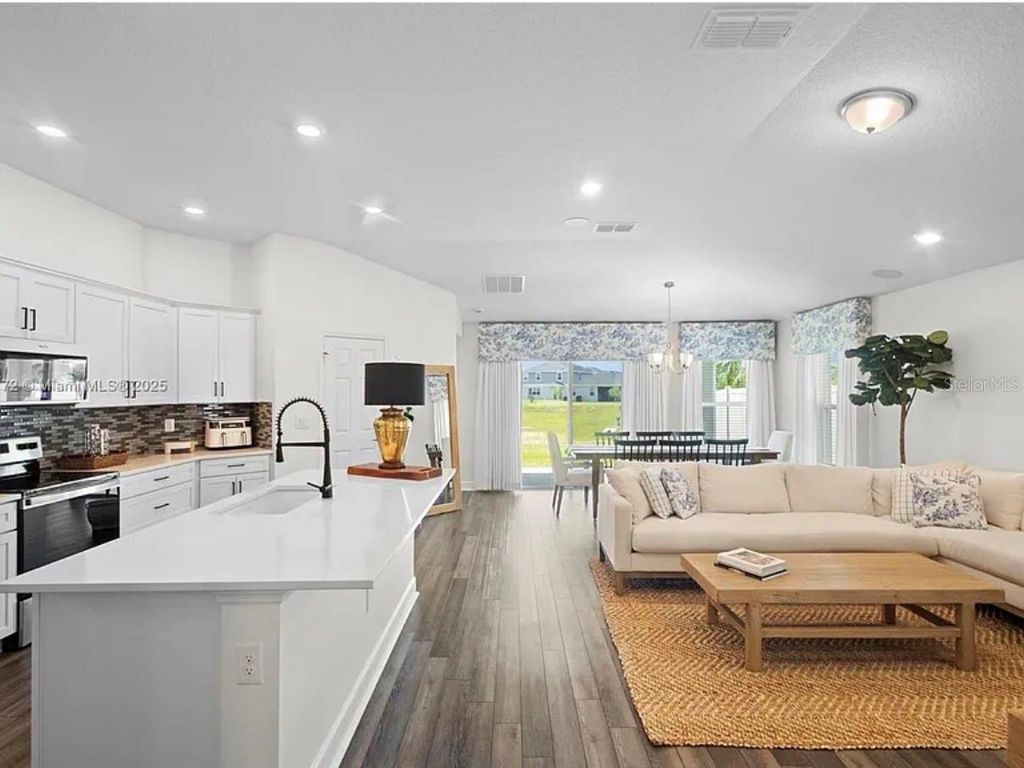 Photo of 9100 Oscraft Drive, Davenport, FL 33896 (MLS # S5142241)