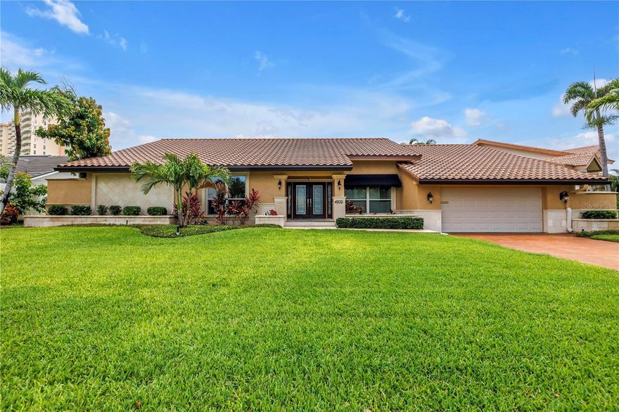 Welcome to Paradise and the desired and sought after gated Bayway Isles Subdivision! This gorgeous ranch home located on the water has many amenities and updates both inside and out. The dock is new in 22 and features a brand new 30,000 lb. boat lift. When it comes to water activities you will love that it's just minutes away from the Boca Ciega Bay and super quick to Shell Island. It's a short boat ride to Fort De Soto State Park and The Gulf of America. Buyers will love the local restaurants and bars that you can get to with this excellent waterway location. The pool and deck were recoated in 25 and the home also offers a pool & spa heater from 23 with new valves, filters and lines. It also has a new chlorine generator installed last year. The house was just painted both inside and exterior June 25. The home has updated kitchen with Jenn Air flat top stove vented out along with nice cabinets, stainless appliances and granite counters. The home features travertine tiles throughout, along with new pavers around the pool, deck, sidewalk and driveway. The AC is Carrier top of the line with ozone anti-bacterial light and whole house filtering system on a 6 month change schedule. All AC ducts were replaced in 22 for efficiency and sanitary reasons. The home has a GE water softener, new washer & dryer along with a built ironing board in a
• large laundry room. All windows are hurricane rated and replaced in 21. The home also features tall ceilings throughout, a built-in wet bar and wood burning fireplace. There is attic stairway and storage space along with a timed circulation fan for cooling the home. The home has 3 solar tubes for lighting along with a lot of windows for natural light. The spacious master bed and large master bath has a whirlpool bathtub and lots of closet space. There are also 2 newer tankless water heaters. Outside the Seawall has been reinforced and injected with two-part foam and 10 drainage filters were installed to improve life. The exterior is professionally landscaped with nice palm trees and mango trees, gorgeous flowers and plants with great curb appeal and nice water view from the backyard. This home is located on an island with 200+ homes and offers peace and tranquility along with neighbors that love to socially interact. This home is just 2 miles from the sugary sands of St Pete Beach and Pass a Grille. Its 1 mile to HWY 275 and super quick to Downtown St Pete including everything there is to see and do such as waterfront restaurants, the pier, parks, museums & more. It's also 30 minutes to Tampa & St Pete Airports and 30 minutes to Clearwater & Sarasota. The location offers some of the best nearby boating waters! This home also comes with peace of mind and a 1-year Home Warranty and is sold furnished for ease of all parties. Welcome home to paradise w gated waterfront life in the beautiful Bayway Isles!