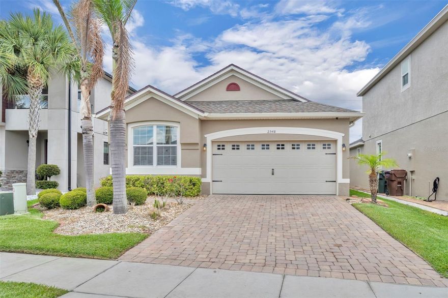 Welcome home to this beautifully maintained and thoughtfully designed 3-bedroom, 2-bath single-family residence, offering approximately 1,706 square feet of comfortable living space in the highly desirable guard-gated community of Tapestry in Kissimmee. This move-in-ready home perfectly blends style, functionality, and lifestyle convenience. Step inside to an open, light-filled layout ideal for both everyday living and entertaining. The modern kitchen serves as the heart of the home, featuring elegant granite countertops, stainless steel appliances, and ample cabinetry. Upgraded lighting fixtures throughout the home add a contemporary touch and enhanced energy efficiency. The spacious floor plan includes generous bedrooms, well-appointed bathrooms, and a versatile office/flex space. Tile flooring flows through the main living areas, with cozy carpeting in the bedrooms. Outside, you can enjoy true Florida living with a screened-in lanai and a peaceful nature view with no rear neighbors. The fenced backyard provides added privacy and is perfect for pets or outdoor relaxation. Additional highlights include: BRAND NEW (2026) A/C unit and hot water heater, fully paid-off solar panels for significantly reduced electricity costs, 2-car garage and brick paver driveway, and access to Tapestry’s resort-style amenities, including a community pool, fitness center, playground, and walking trails. Conveniently located just minutes from The Loop shopping center, major highways, dining, and Walt Disney World Resort, this home offers the perfect combination of privacy and the sought-after Central Florida lifestyle.