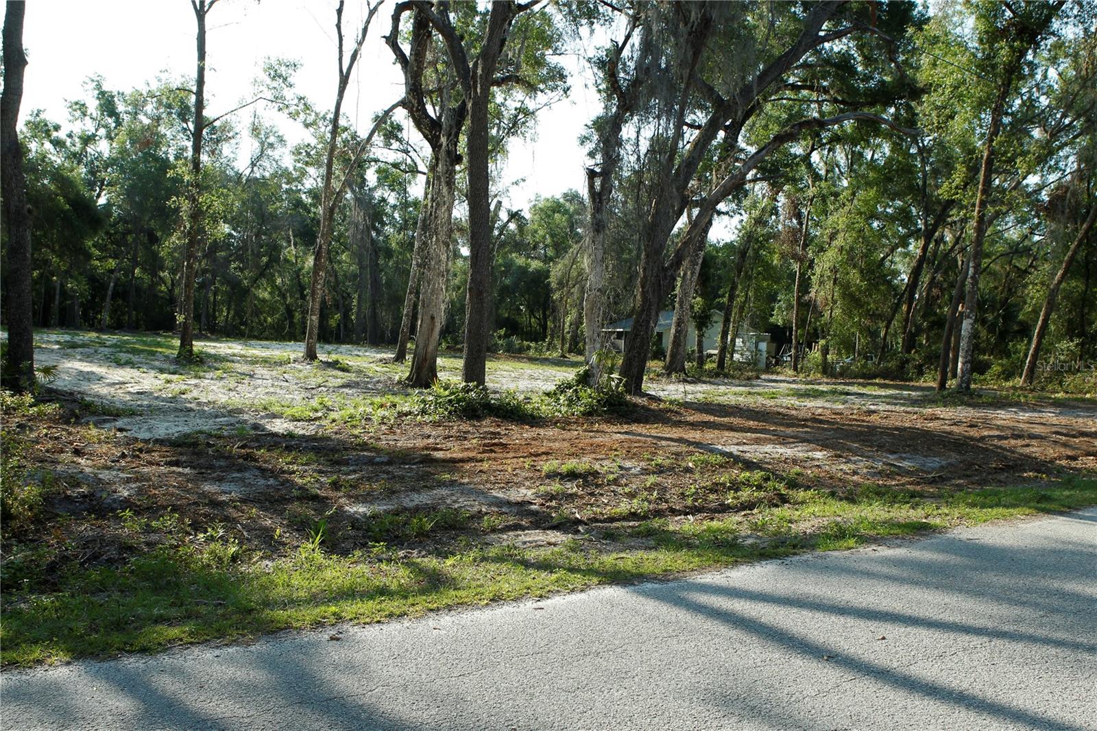 Cleared and ready to build, this beautiful 1.12-acre lot offers the perfect blend of peace, privacy, and convenience. Situated on a paved road with easy access to Hwy 301, Hwy 50, and I-75, you’re centrally located between Ocala, Tampa, and Orlando—ideal for commuters or weekend getaways. Enjoy the best of Florida’s outdoor lifestyle just minutes from top recreation spots, including fishing and boating, Croom ATV riding trails, Rails to Trails, and the Withlacoochee State Forest. Best of all, this property is not in a flood zone, giving you peace of mind year-round. Whether you're looking to build your forever home or a weekend retreat, this is the opportunity you've been waiting for. Don’t miss your chance to own a slice of paradise!