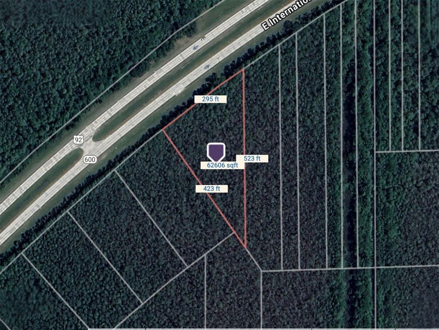 1.5-acre buildable lot on E International Speedway Blvd (US-92) in DeLand, Volusia County. Zoned RC (Resource Corridor), ideal for single-family homes or small residential development along a high-traffic corridor, with natural features preserved.

Parcel ID: 6120-01-03-0030. Lot dimensions are approximately 295 ft (front) x 423 ft x 523 ft, totaling 62,606 sqft. Located in Flood Zone A, so flood insurance may be required. Coordinates: 29.09575846, -81.22225609. This lot offers a rare opportunity to build in a visible, accessible location along a major U.S. highway