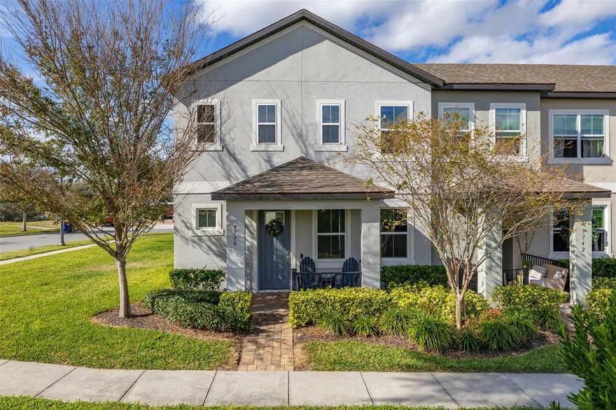 Welcome to this beautifully appointed 4 bedroom, 2.5 bath end unit townhome with a front porch offering a stunning view of the Disney fireworks. Situated on an oversized lot, this home features a spacious downstairs bedroom/office space, perfect for remote work or study. The first floor boasts elegant ceramic tile throughout, including the large kitchen with stainless steel appliances, a generous island with a double sink and upgraded faucet, ample cabinet storage, granite countertops, and a walk-in pantry. The inviting great room opens up to a covered patio through sliding glass doors, perfect for indoor/outdoor living. Adjacent to the kitchen, the dining room features upgraded lighting, and a convenient entrance door leads to the two-car garage, which is equipped with a Tesla charger and pre-wired for a second. Upstairs, the primary bedroom is ideally located at the front of the home, offering a peaceful view of the Disney fireworks. It includes a spacious walk-in closet and a luxurious primary bath with granite countertops, dual sinks, a walk-in shower and a toilet closet. The second level also features a laundry room with Samsung front-loading washer and dryer on pedestals. Two additional bedrooms at the rear of the home are generously sized, each with built-in closets, and share a full bath with a tub/shower combo, granite counters, and tile floors. This home is conveniently located near the 429, schools, shopping, and just minutes from Disney World. Don't miss out on this incredible opportunity!