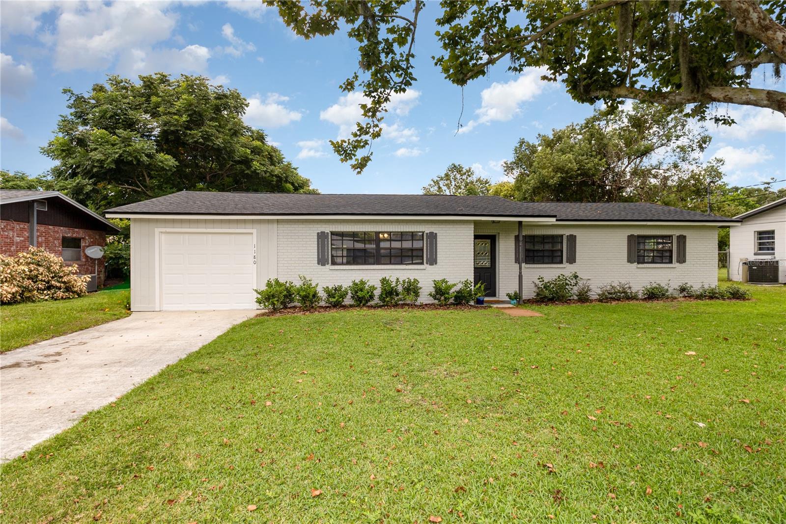 Welcome to this charming 3-bedroom, 2-bathroom home in Bartow with no HOA, giving you the freedom to truly make it your own. Recent updates provide peace of mind, including a brand-new 2025 roof, 2025 water heater, and a new water softener. Step inside to a light and bright interior featuring updated vinyl flooring in the main living areas, carpet in the bedrooms, and ceiling fans throughout for year-round comfort. The kitchen offers new stainless steel appliances, plenty of cabinet space, and a dining area perfect for everyday meals. Just beyond, a back sunroom adds extra living space for relaxing or entertaining. The primary bedroom features a private bath with a newly tiled shower. Additional bedrooms are comfortably sized and share a full bathroom. A convenient utility room adds functionality. Out back, a large fenced yard provides plenty of room for outdoor activities, gardening, or lounging in the Florida sunshine. A storage shed is included for lawn equipment or tools. Located close to the Bartow Sports Complex, zoned schools, and SR-60 for easy travel, this home combines comfort, convenience, and value. Schedule your showing today!