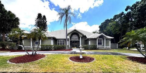 Photo of 8935 Jonathan Manor Drive, Orlando, FL 32819 (MLS # O6298264)