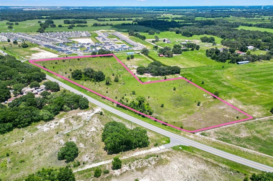 Prime 15.5± Acre Development Opportunity with 986 Linear Feet of HWY 301 Frontage! Located in the heart of Sumter County and just minutes from Middleton and the rapidly expanding Villages MSA, this 15.5± acre parcel offers exceptional potential for commercial, mixed-use, residential, or multi-family development. The property features utilities from the City of Bushnell that include water, sewer, and gas. With flexible future land use possibilities and proximity to one of the fastest-growing retirement communities in the nation, the property presents a rare opportunity for investors and developers alike. Whether envisioning a vibrant mixed-use community, a retail hub, commercial site, or a residential enclave, this site is strategically positioned to capitalize on the area's surging growth, infrastructure, and demand. Seize this chance to be part of Sumter County’s thriving future! Parcel can get divided.
