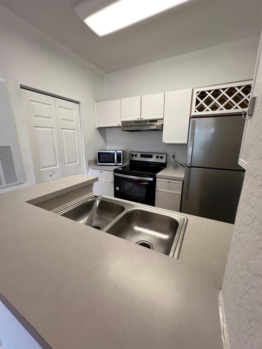 Photo of 2674 Robert Trent Jones Drive #334, Orlando, FL 32835 (MLS # O6438558)