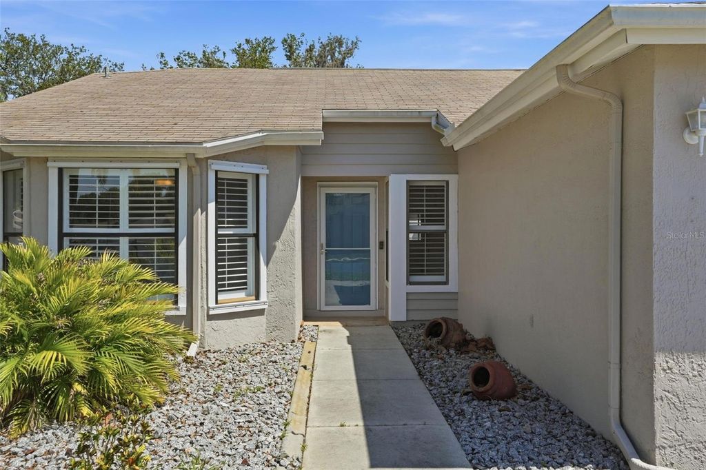 Photo of 10616 Bucks Run, New Port Richey, FL 34654 (MLS # TB8509522)