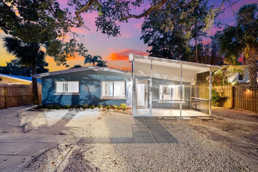 One or more photo(s) has been virtually staged. Incredible Value! Don't miss this one! Buy now and enjoy for season. Welcome  to The Blue Lagoon... when you walk in it feels like new construction! A  private modern coastal retreat perfectly positioned on Siesta Key’s tranquil Heron Lagoon...  the ultimate vacation home or  investment property.  This exceptional, gated quarter-acre compound offers the rare combination of serenity, design, and functionality, ideally located between Turtle Beach and Crescent Beach, just moments from the iconic Point of Rocks. Enter through a secure electric gate framed by custom wood fencing and arrive under a majestic live oak canopy that sets the tone for the natural beauty and privacy within. Designed to maximize indoor-outdoor living, the home features two expansive screened lanais, a sparkling private pool, an extensive wood deck, lush tropical landscaping, and a private dock where you can launch a paddleboard, kayak, or canoe directly into the peaceful lagoon. The single-level custom residence offers a thoughtfully designed 3-bedroom, 2-bath layout with wide-plank wood-look tile flooring in soft white and gray tones, crisp white walls, black metal hardware, and premium wood and metal ceiling fans throughout. Soaring ceilings are clad in hand-cut cypress wood shiplap, adding both natural warmth and acoustic insulation. The gourmet kitchen is a chef’s dream, featuring high-gloss European cabinetry, quartz countertops, a striking wood-grain tile backsplash, and Café Series stainless steel appliances including a six-burner gas range with a double oven and a counter-depth French door refrigerator with filtered and instant hot water. A whole-home water filtration system ensures pure water at every tap. The spacious master suite is a true sanctuary with a double-closet hallway, soaring ceilings, and a large window and sliding glass door that open to the lanai. The spa-inspired en suite bath features floating dual white European vanities, a luxurious rainwater shower with Kohler gold fixtures, floor-to-ceiling “blue skies” tile, and organic gray cobbled stone flooring. The peaceful sound of rainfall on the metal roof at the rear of the home enhances the retreat-like experience. The guest bath offers equally sophisticated design, with iridescent honeycomb tile behind a deep soaking tub and rich gray tilework throughout.
Every detail of this home has been carefully curated to reflect the essence of the Siesta Key lifestyle, luxurious, relaxed, and deeply connected to nature. Whether you’re looking for a full-time residence or a seasonal escape, The Blue Lagoon offers a once-in-a-lifetime opportunity to own a coastal property where water views, natural beauty, and modern comforts unite in perfect harmony. In addition to being a stunning private residence, this property is also ideal for seasonal use or as a high-performing vacation rental. Similar properties on Siesta Key routinely generate over $100,000 per year in rental income, making this an excellent opportunity to enjoy the home while having it support itself or even contribute toward paying it off. Use it as a vacation retreat while earning income and always have a beautiful place to stay on Siesta Key. And if your long-term vision includes building your dream home, please inquire directly about available building plans for the lot by Island Series with Yoder Homes. Visit  the link for a 3D tour, video and floor plan. 
https://nextlevelmediasrq.hd.pics/8234-Midnight-Pass-Rd/idx