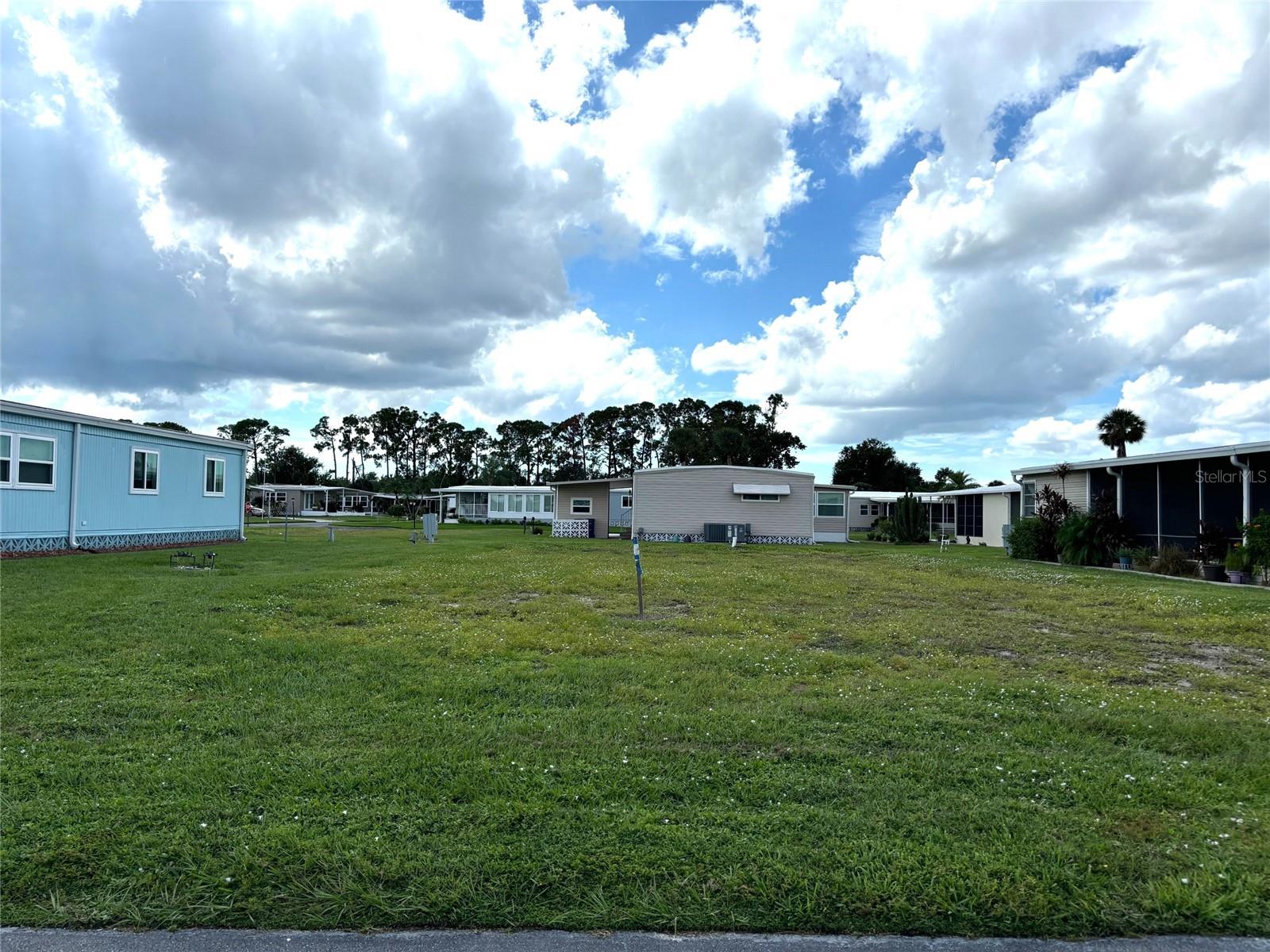 Vacant lot in a vibrant 55+ community! La Casa offers the ultimate Florida lifestyle. We have 974 homes nestled among a variety of native trees with spacious common grounds surrounding our eight lakes. Located between Sarasota and Fort Myers, this is a boater's dream with access to the Gulf of Mexico. It is convenient for shopping, sightseeing, golfing, fishing, and boating, as well as all the culture and elegance the Southwest Florida area is noted for. La Casa may have the best pools in the area. Our crown jewel is an extremely large, 40 X 60-foot swimming pool that is kept at a perfect 87 degrees. Our smaller 20 x 40 pool is quietly nestled between the clubhouse and the Activity Building. Both pools have adjacent hot tubs which are ideal for soaking muscles that are tired from golfing or tennis. Wireless Internet (Wi-Fi) is available at the Clubhouse, Activity Building, and Recreation Hall area where these pools & spas are located, so you can catch some rays while you catch up on your email! Sound entic