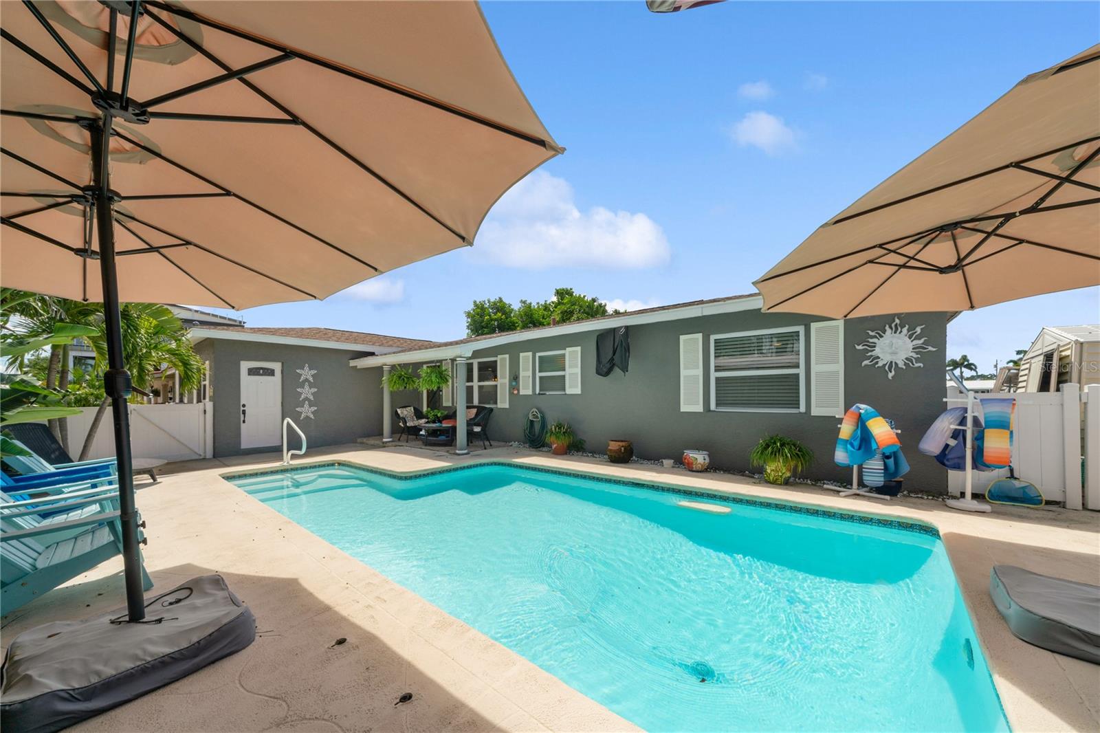 Incredible location is what you'll find in this Causeway Isle waterfront home. Fantastic location just off the
Intracoastal waterway if you are into fishing or boating or going to some great restaurants or the beaches. This
3 bedroom 3 bath with a swimming pool has a 42 ft dock, 2 boat lifts, water and electric, fish cleaning station,
2 dock boxes and a fresh water wash down system for your boat. Included in the 42' dock is a 12 X 15 area at
the end. Easy access to the Gulf with no fixed bridges. The home also offers large outdoor covered patio and
bar with 3 ceiling fans and a TV. The beautiful spacious kitchen has new dishwasher and oven. The hot water
heater also is new. The home did have approximately 4 inches of water during hurricane Helene. The
damage was professionally repaired. The laundry room is very spacious and has room for storage. The 2 car
garage was converted into the 3rd bedroom. The home has Luxury Waterproof Vinyl Plank flooring through
out.