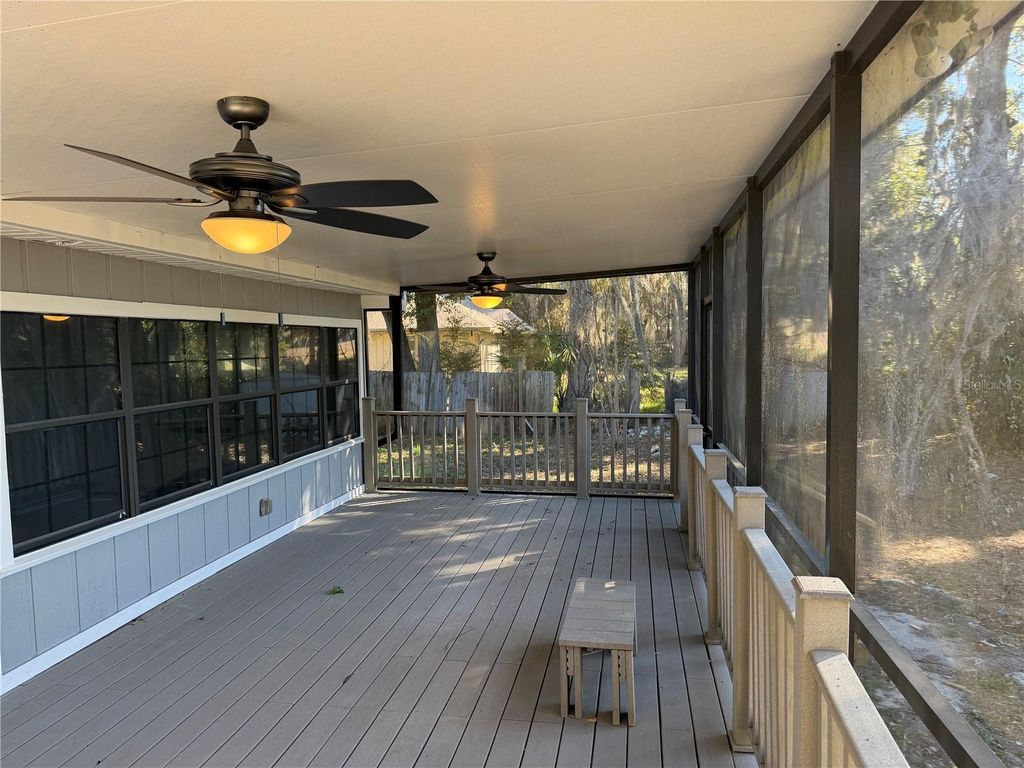 Photo of 8215 SW 57th Place, Gainesville, FL 32608 (MLS # OM717933)