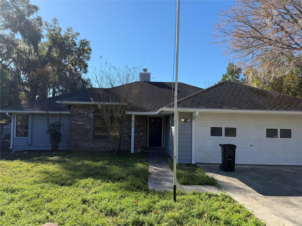 Photo of 8215 SW 57th Place, Gainesville, FL 32608 (MLS # OM717933)