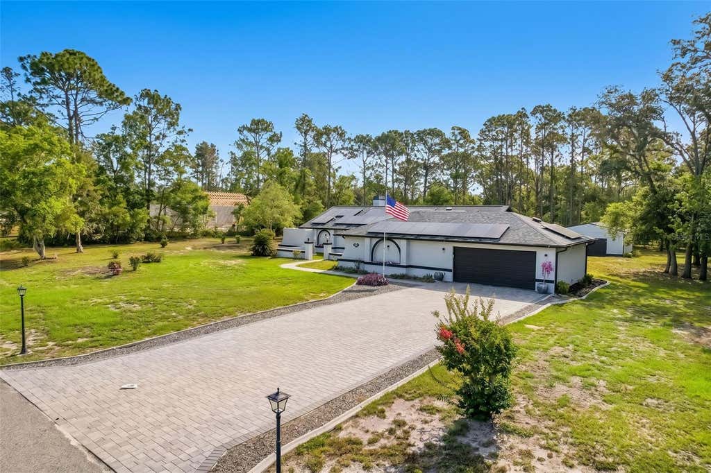 Photo of 2044 Tunisia Avenue, Spring Hill, FL 34609 (MLS # W7886492)