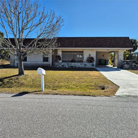 Photo of 5290 Neville Terrace, Port Charlotte, FL 33981 (MLS # D6146029)