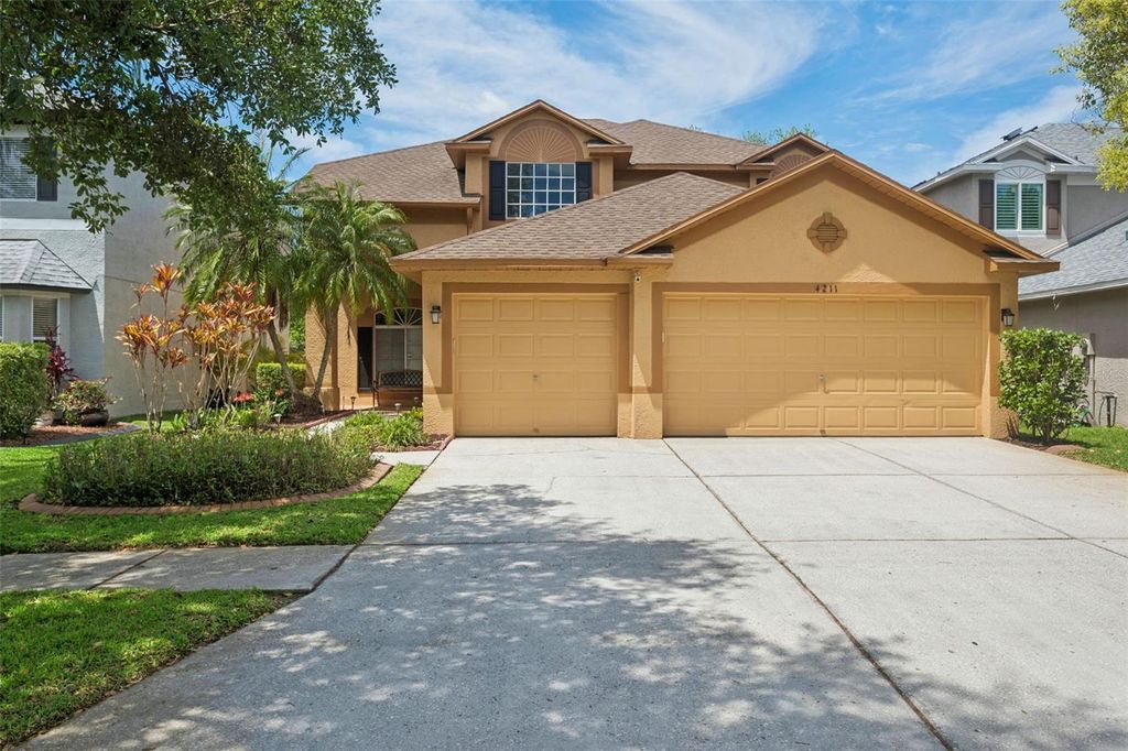 Photo of 4211 Harbor Lake Drive, Lutz, FL 33558 (MLS # TB8497834)