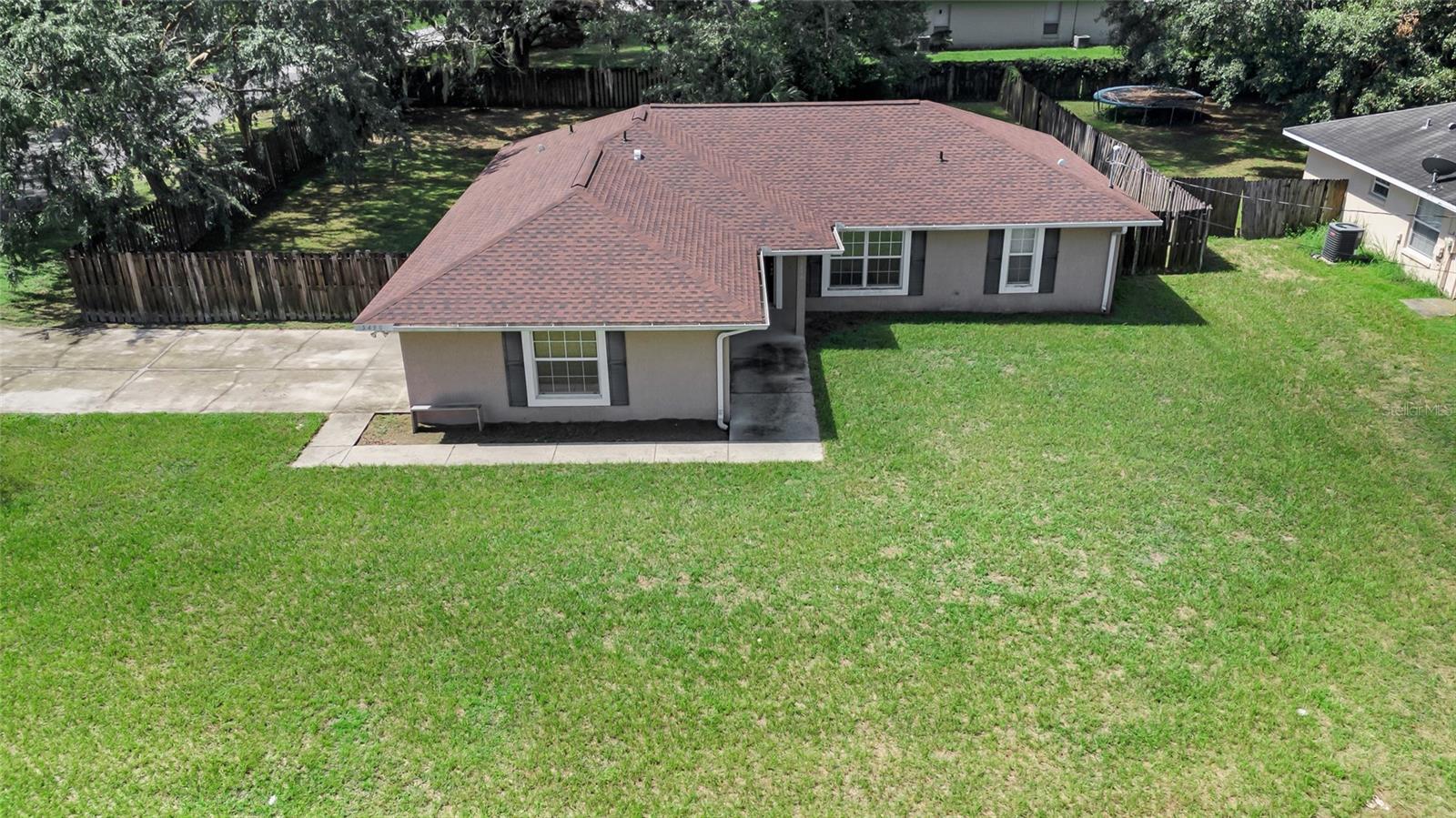 BRAND NEW ROOF 2025. Charming 3-Bed, 2-Bath Home in Ocala – Updated and Move-In Ready! Welcome to your new home in beautiful Ocala, Florida! This 3-bedroom, 2-bathroom 2-car garage residence offers comfort, style, and peace of mind with recent updates throughout. Step inside to find fresh interior paint, brand new flooring, and a new roof that adds both value and durability. The kitchen is spacious and functional, with plenty of cabinetry and room to add your personal touch. All three bedrooms are generously sized, and the primary suite features a private en-suite bath for added convenience. Enjoy Florida living with a spacious yard perfect for gardening, play, or relaxing under the sun. Located in a quiet neighborhood with easy access to shopping, dining, parks, and schools—this home combines comfort and location at a great value. Don’t miss your chance to own this updated Ocala gem—schedule your private tour today!