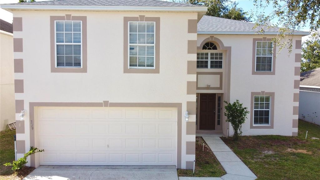 Photo of 329 Blake Avenue, Davenport, FL 33897 (MLS # O6359053)