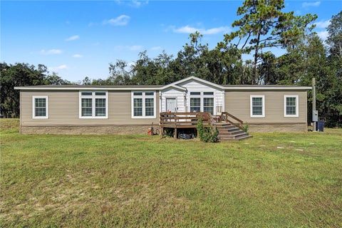 Photo of 30436 Calle Lane, Wesley Chapel, FL 33543 (MLS # TB8553543)