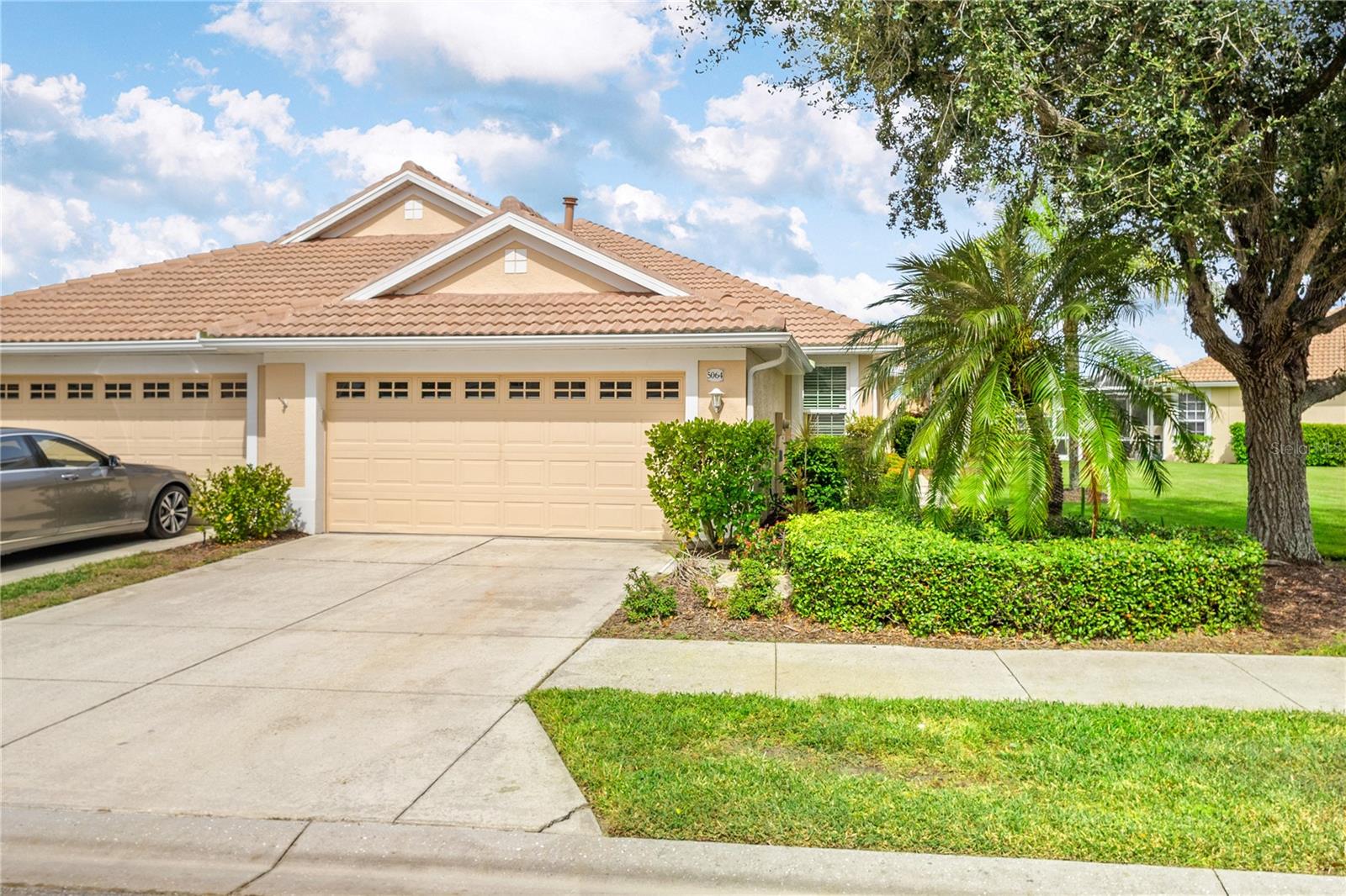 5064 WHISPERING OAKS DRIVE
