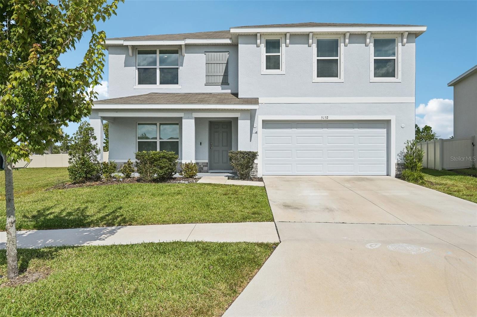 Welcome home to this modern yet inviting 5-bed PLUS den, 3-bath residence (2,674 sq ft) built in 2023, nestled in the sought-after Berry Bay community. Right as you step into the grand foyer, you’ll get a feel for the airy, open design: the formal dining space flows into the living area. On the main floor, a well-appointed gourmet kitchen awaits with granite countertops, stainless steel appliances, a walk-in pantry, and a generous center island that’s perfect for casual meals or catching up over coffee. A full bedroom and bath on this level lend flexibility for guests or in-laws.
Head upstairs and you’ll discover a spacious loft—ideal as a secondary living space, media room, home office, or creative corner. Also, the upper floor laundry room. The primary suite is a peaceful retreat, complete with dual vanities, an oversized walk-in closet, plus an extra walk-in closet, and a spa-like shower. Each of the secondary bedrooms is nicely sized and move-in ready. The home also features extended tile in the main living/dining areas and carpet upstairs.
Outside, the open lanai beckons for morning coffee or evening conversations, and the sizable backyard in your premium lot offers room to roam. Out front is a wonderful green/conservation area to enjoy. Smart home technology and an irrigation system bring both convenience and efficiency. With a 2-garage and low HOA fees, you get both space and value.
As part of Berry Bay, you’ll enjoy access to community perks like a resort-style pool, a clubhouse, basketball courts, a dog park, and a playground. CDD fees are part of your taxes. The location is especially convenient—just minutes from I-75, which means you’re close to shopping, dining, schools, and easy connections to St. Pete, Downtown Tampa, or Sarasota.
Reach out today to schedule your private showing—this one’s poised to be claimed quickly!