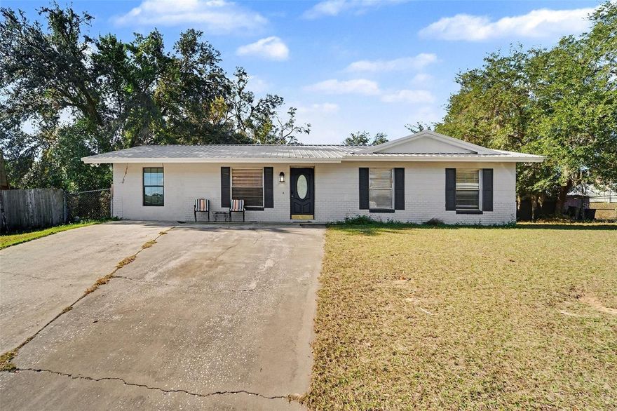Welcome to this move-in ready, charming 3-bedroom, 1.5-bath home located at 37124 Goldenrod Court in Dade City, FL—an excellent opportunity for first-time homebuyers, growing families, or anyone seeking space, comfort, and a quiet, family-friendly neighborhood with NO HOA. Situated on a large lot with a spacious rear carport, this property offers plenty of room for kids, pets, gardening, extra storage, and outdoor entertaining—perfect for enjoying the Florida lifestyle without added restrictions or fees.

Inside, you’ll find new luxury vinyl plank (LVP) flooring throughout, offering a modern look with durability ideal for everyday living. The functional floor plan provides comfortable living spaces and well-sized bedrooms, making this home an ideal starter home or primary residence. Major upgrades include a new roof installed in 2022, providing peace of mind and helping keep ownership costs low—an important benefit for first-time buyers.

The expansive backyard is a true highlight, offering endless possibilities for outdoor activities, play areas, or future improvements. Whether you’re hosting gatherings or creating your own private retreat, this home delivers flexibility and value. Located on a quiet cul-de-sac, it offers privacy while still maintaining a convenient location.

Just minutes from historic downtown Dade City, residents enjoy easy access to local shops, dining, parks, schools, and community events. With nearby shopping, major roadways, and commuter routes, this home combines affordability, space, no HOA restrictions, and recent updates—making it a fantastic opportunity for first-time homebuyers and a great family home ready for its next chapter.